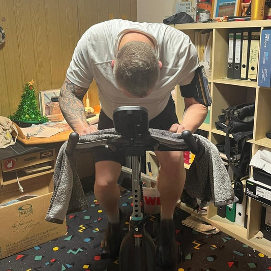 Person relieving work stress and enjoying a sense of freedom on a Wenoker Exercise Bike