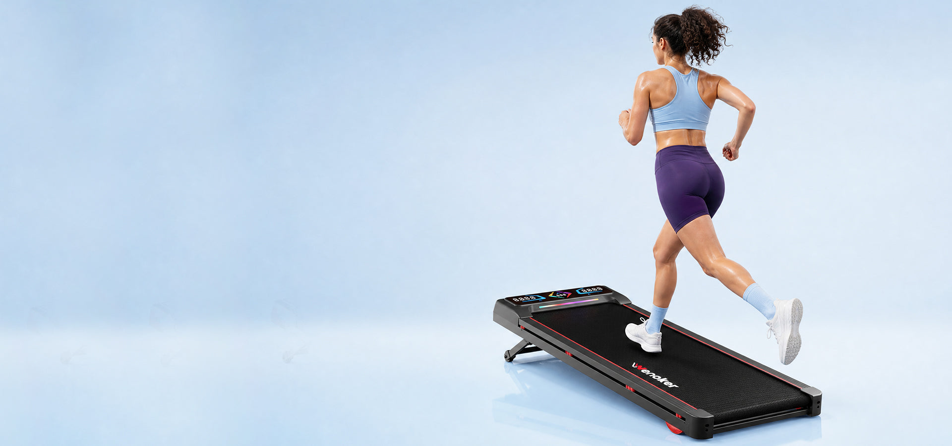 Woman riding a Wenoker exercise bike in a calm home living room