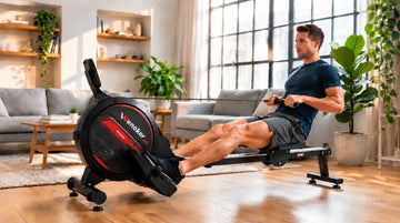 An athletic rower demonstrating proper finish position form on the sleek black Wenoker R10 magnetic rowing machine in a modern sunlit apartment.