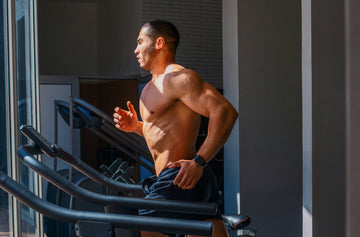 Runner maintaining optimal cadence on a treadmill with proper form