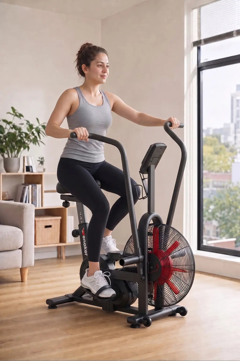 A woman working out on a Wenoker A20 air resistance exercise bike with dual-action handlebars in a bright home living room.